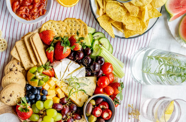 Cheese and fruit board summer picnic foods

